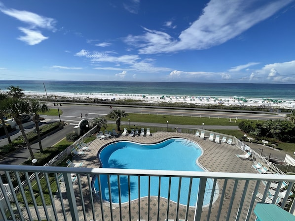 Enjoy unobstructed views of the beach and gulf from the private balcony.    