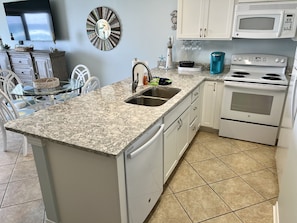 Granite countertops and lots of updates in fully appointed kitchen.