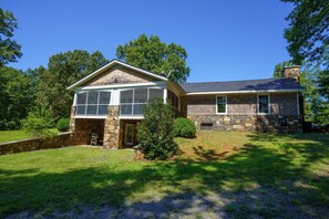 Side of house with screened porch