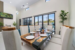 Gather around and make memories in the inviting dining area — perfect for shared meals, game nights, or simply enjoying good company.