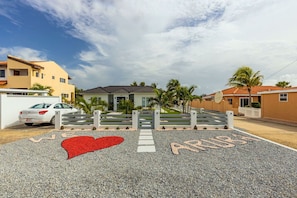 We Love Aruba sign on Front Yard