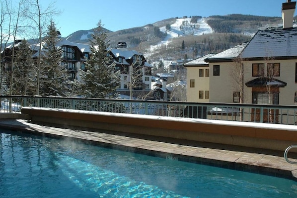 Pool deck is fully visibly from unit's private patio!