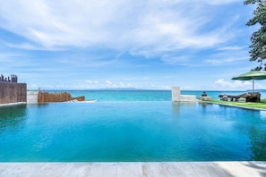 Shared swimming pool with ocean view