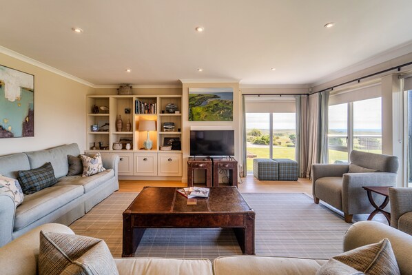 Seating area with views over Cruden Bay golf course