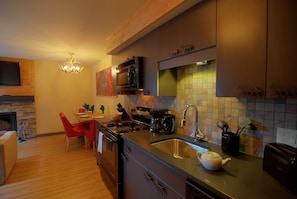 Prepare a meal in the fully-equipped kitchen and enjoy it in the dining area.
