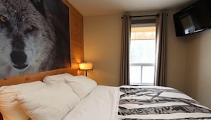 You'll sleep deeply in this comfy king-sized bed.