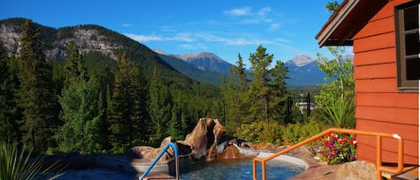 Soak in these incredible SHARED hot tubs overlooking the town of Banff and the Rockies