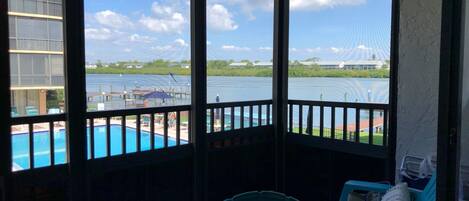 View of the intercoastal water of Indian Shores and the waterfro - View of the intercoastal water of Indian Shores and the waterfront pool from the screened in balcony!