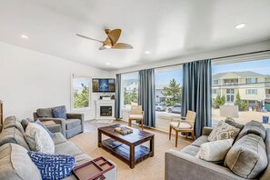 Top-Level Living Room with Deck Access