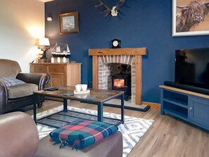 Living room | MacRury Cottage, Balemore, near All Outer Hebrides