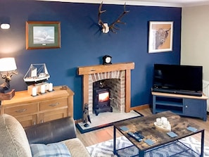 Living room | MacRury Cottage, Balemore, near All Outer Hebrides