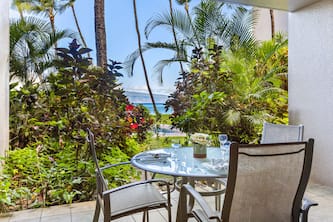 Tropically lush grounds with beachfront breezes