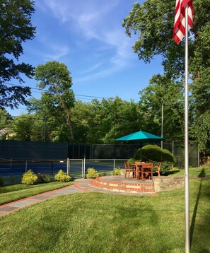 Tennis court and patio for guest use