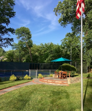 Tennis court and patio for guest use