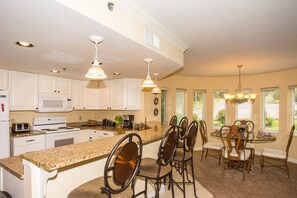 Fully equipped kitchen with plenty of seating!