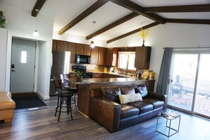 Large living room with easy access to the kitchen.