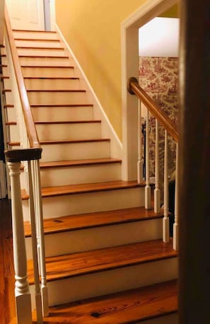 Staircase to upstairs 3 steps from your entrance at front door 