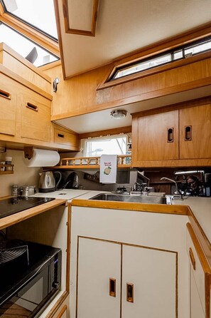 The fully functional galley, complete with a stove, convection oven, and more!