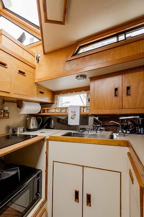 The fully functional galley, complete with a stove, convection oven, and more!