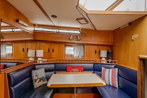 Enjoy a meal around the table in the fully functional galley and dinette table.