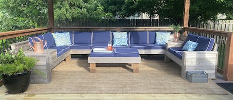 Gather and enjoy the backyard on this deck wrapping sectional!