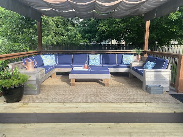 Gather and enjoy the backyard on this deck wrapping sectional!