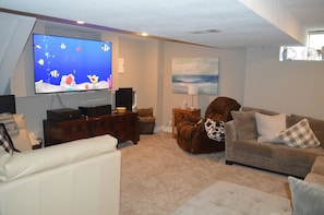 Theater Room.  75" Smart TV, Sound System, PS4, Comfortable Seating - Enjoy!
