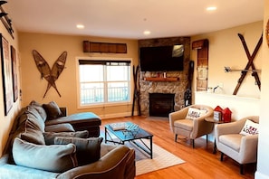 Cozy Living Room. Gas Fireplace and Large Smart TV