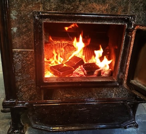 Warm up by Wood burning stove (some wood is provided)