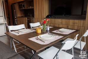 All YotelPad furniture in the condo is mindfully designed. The fold-out chairs are located in the closet by the entrance door.