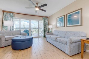 Living room features a sleeper sofa for two.