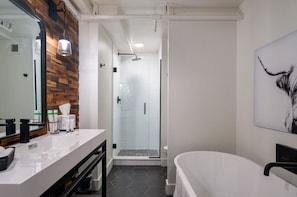 spa soaking tub in rustic modern bath