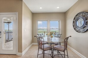 Dining area with a marsh view and seating for 6.