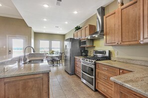 Full functional Kitchen - stainless steel appliances.