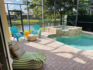 Pool Area with Spa and lakeview