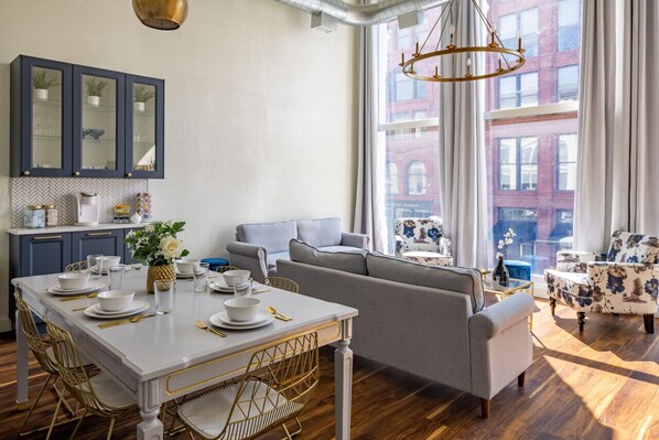 ceiling to floor windows with downtown views