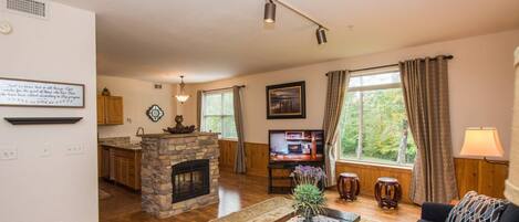 Enjoy the comfortable seating in the living room while watching your favorite shows.