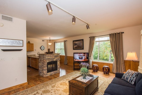 Enjoy the comfortable seating in the living room while watching your favorite shows.