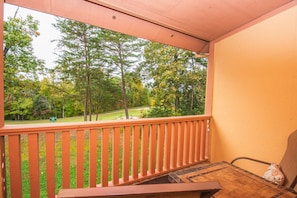Enjoy morning coffee on the porch with seating for 2 with views overlooking the golf course.