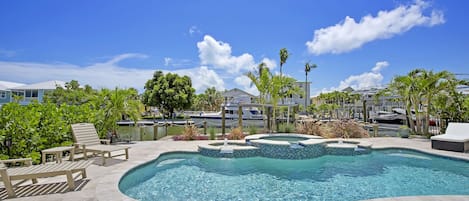 Sparkling pool with canal views