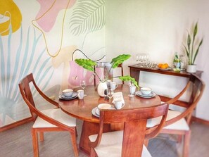 Table that seats 6 and our beautiful painted mural. 

