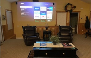 Wow! New full-wall projection system! Terrific for evening entertainment.