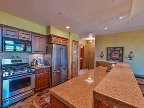 Great open floor plan to cook dinner while still being part of the fun