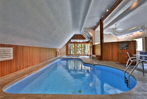 The fitness center features an indoor pool, hot tub, sauna, and a small fitness area