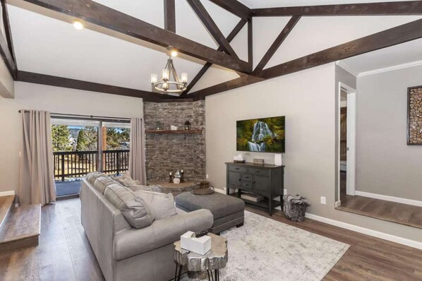The living area features high ceilings.