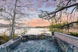 Hot tub with lake views.