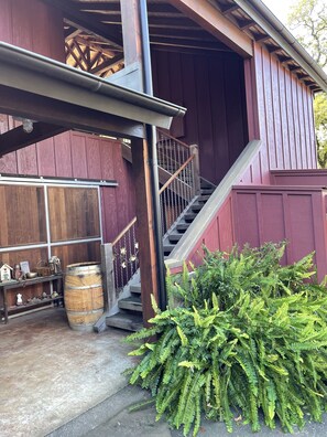 Stairs up to Barn rental unit.