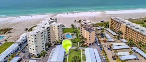 Aerial view of Jamaica Royale complex with 3 heated pools.  The condo is less than 60 seconds to the sand and even less to the heated pool