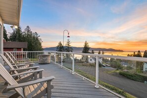 The wrap around deck has a grill and fire pit for relaxing at the end of the day. -James A.