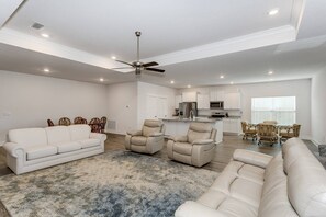 Huge open concept living room, dining room and kitchen with space for the whole family